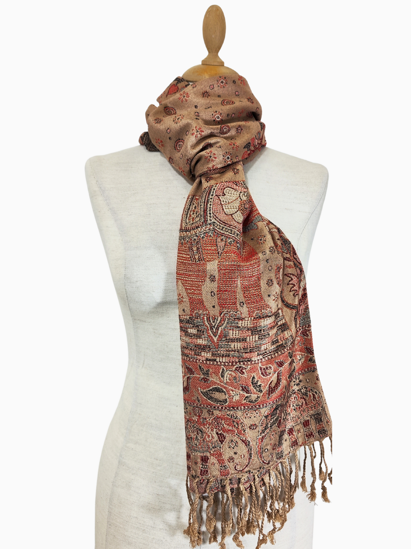 Beautiful pashmina shawl with a vibrant design. It has a predominantly Beige background with intricate floral and elephant motifs in shades of red, gold, and blue