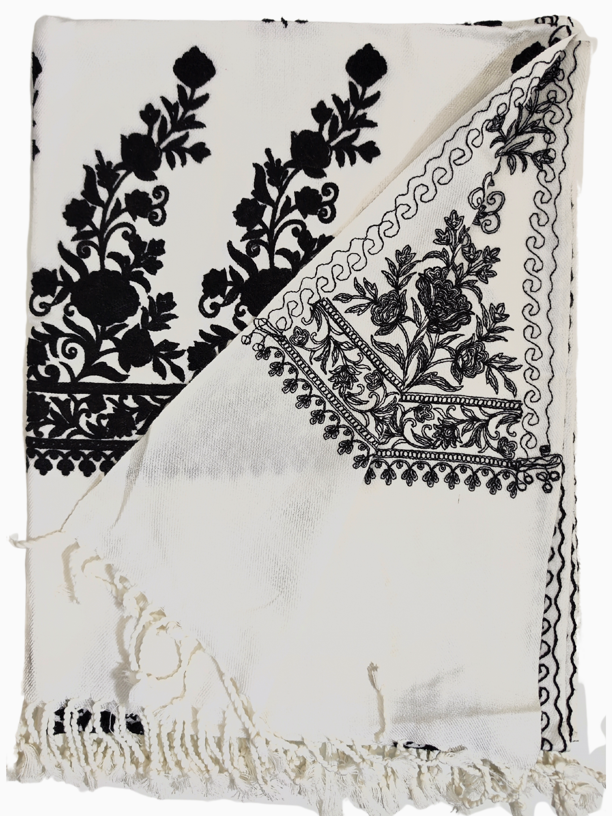 Aari embroidered woollen shawl from Kashmir, featuring intricate floral motifs on a white background. A luxurious woollen shawl from Kashmir, showcasing intricate Aari embroidery with delicate floral motifs. The white shawl features black embroidery and a fringed edge. Aari embroidery shawl. Kashmir shawl. woollen shawl. embroidered shawl. Indian shawl. Pashmina shawl