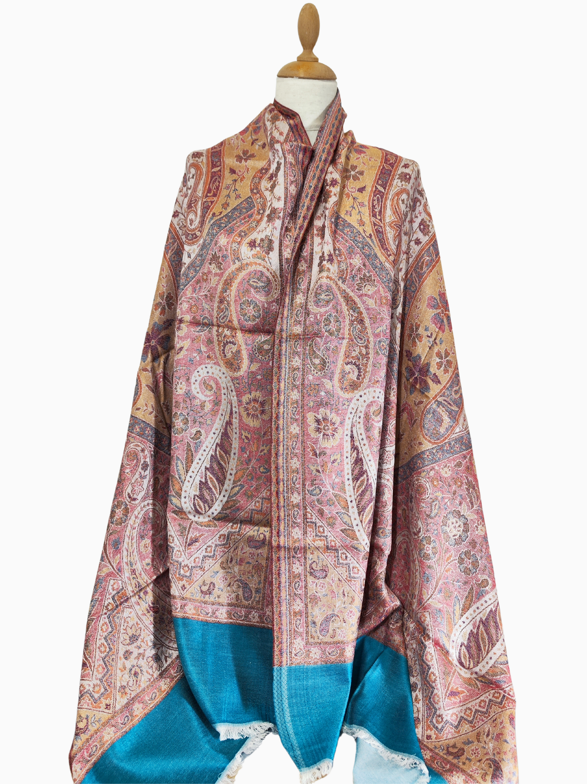 Double-Sided Vibrant Paisley Shawl in Pink, Blue, and Orange.  Crafted from a premium silk and wool blend, this shawl is lightweight yet warm