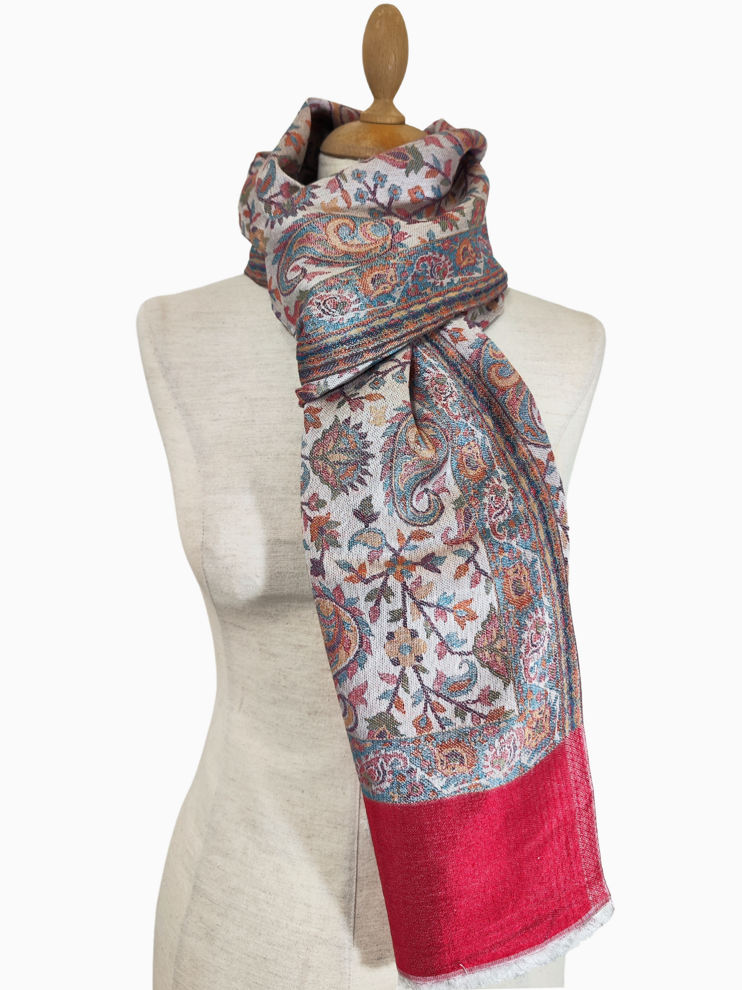 Restez au chaud et élégant avec ce magnifique châle en pashmina. Il présente un motif floral captivant en rouge, bleu et vert. Acheter ce châle